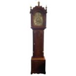 A LATE 18TH CENTURY EIGHT DAY MAHOGANY LONGCASE CLOCK With brass finials above a brass and