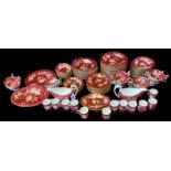 A COLLECTION OF VINTAGE WEDGWOOD PORCELAIN 'TONQUIN RUBY' TABLEWARE Comprising twelve dinner plates,