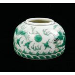 A CHINESE PORCELAIN SPHERICAL 'DRAGON' INKWELL With green opposing dragons chasing a flaming