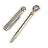 MUST DE CARTIER, TWO 18CT GOLD PLATE AND STEEL TRINKETS A keychain penknife and propelling pen, each