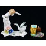 KARL ENS, THURINGIAN, AN AMUSING EARLY 20TH CENTURY PORCELAIN FIGURAL GROUP, SEMICLAD YOUNG BOYS AND