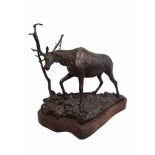 BUNNY CONNELL, AMERICAN, A 20th CENTURY BRONZE FIGURE OF A STAG Limited edition, in standing pose on