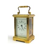 BERNARD FRÈRES, A VINTAGE GILT BRASS CARRIAGE CLOCK Having four bevelled glass panels, marked '