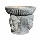 A GRANITE PLANTER/BIRD BATH Carved with facial masks. (w 60cm x 51cm) Condition: good overall