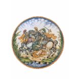 AN ITALIAN MAJOLICA RENAISSANCE STYLE CHARGER Painted with a dramatic battle scene with soldiers