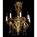 19TH CENTURY FRENCH NEOCLASSICAL GILT BRONZE AND ORMOLU EIGHT BRANCH CHANDELIER Decorated with