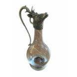 AN EARLY 20TH CENTURY CONTINENTAL SILVER PLATED CLARET JUG FORMED AS A STAG Having a clear glass