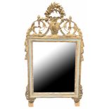 AN 18TH CENTURY ITALIAN CARVED GILTWOOD AND PAINTED PIER MIRROR Decorated with foliage and swags. (