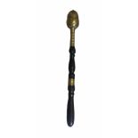 AN UNUSUAL EARLY 19TH CENTURY BRONZE AND EBONY TIPSTAFF The large screw-off acorn pommel, on a