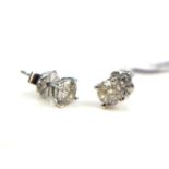 A PAIR OF 18CT WHITE GOLD DIAMOND STUDS. (approx. 1ct total)