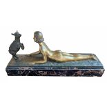 JOSEPH D'ASTE, AN ART DECO BRONZE STATUE OF A NUDE FEMALE WITH LAMB Raised on a marble base,