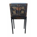 A PORTABLE INLAID EXPORT LACQUER NANBAN CABINET ON STAND Momoyama period (1573-1615) late 16th/early