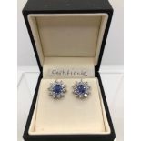 A PAIR OF 18CT WHITE GOLD, CORNFLOWER BLUE SAPPHIRE AND BRILLIANT CUT DIAMOND EARRINGS. (1.07ct G-