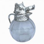 A LARGE SILVER PLATE AND GLASS BOARS HEAD CLARET JUG Having a hinged lid with handle and a fluted