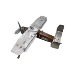 A SCRATCH BUILT ALUMINIUM AND WOODEN MODEL BIPLANE. (length 36cm x 42cm) Condition: good