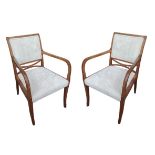 A PAIR OF EARLY 20TH CENTURY AUSTRIAN SATIN BIRCH OPEN ARMCHAIRS Newly upholstered in a beige cut