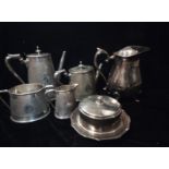 A VICTORIAN SILVER PLATED FOUR PIECE SILVER TEA SERVICE Comprising a coffee pot, teapot, sugar basin