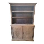 AN EARLY 20TH CENTURY STONEWASH PAINTED DRESSER With open shelves above cupboards carved with