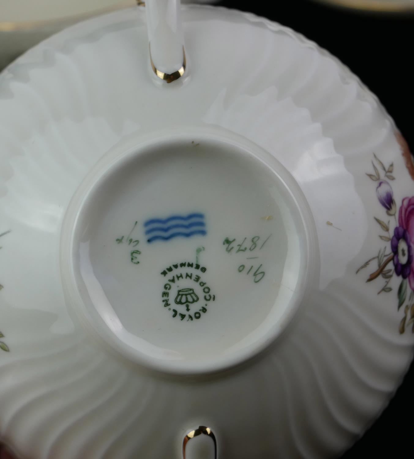 ROYAL COPENHAGEN, A SET OF FOUR VINTAGE DANISH PORCELAIN SOUP BOWLS Having twin handles and floral - Image 3 of 5