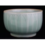 A CHINESE CELADON GLAZE CIRCULAR POTTERY BOWL With leaf decoration. (approx 15cm x 11cm)