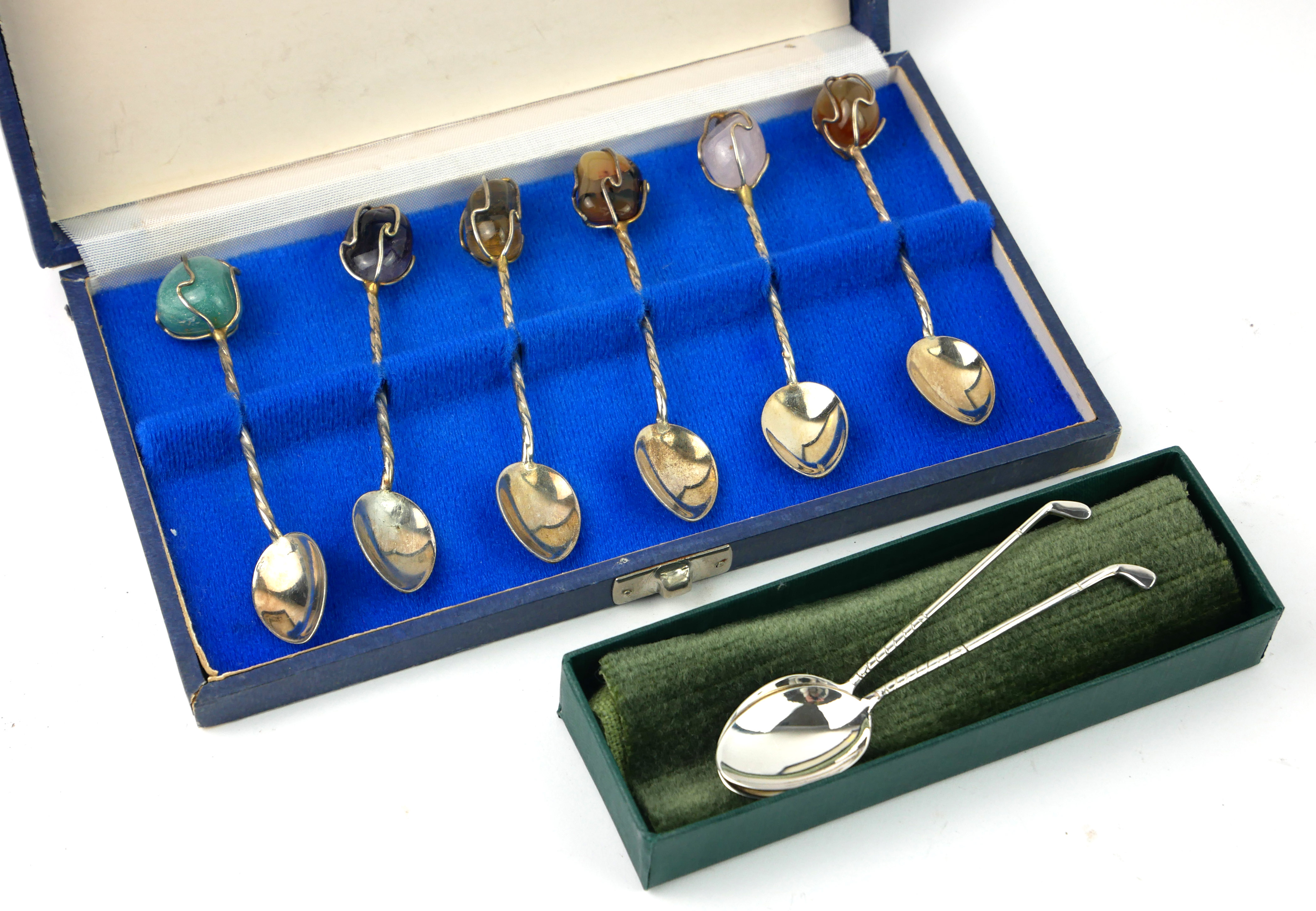 A PAIR OF BOXED HALLMARKED SILVER NOVELTY GOLF CLUB (HIM&HER) SPOONS One hallmarked for