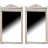 A PAIR OF REGENCY STYLE MIRRORS With serpentine cartouche above a bevelled silver plate. (76cm x