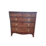 AN EARLY VICTORIAN MAHOGANY CHEST With two short above three long drawers fitted with oval brass