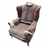 A VINTAGE WING ARMCHAIR With later sheepskin upholstery. (w 78cm x h 102cm x d 93cm) Condition: good