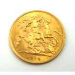 AN EARLY 20TH CENTURY 22CT GOLD HALF SOVEREIGN COIN, DATED 1914 With King George and Dragon verso.