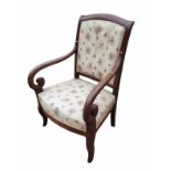 A 19TH CENTURY FRENCH MAHOGANY OPEN ARMCHAIR Having scroll arms and floral fabric upholstery, on