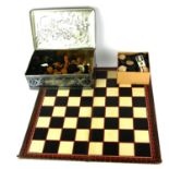 A COLLECTION OF EARLY 20TH CENTURY WOODEN CHESS AND DRAUGHTS GAMING PIECES A Staunton chess set (one