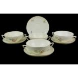 ROYAL COPENHAGEN, A SET OF FOUR VINTAGE DANISH PORCELAIN SOUP BOWLS Having twin handles and floral