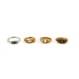 A COLLECTION OF THREE VICTORIAN AND LATER 18CT GOLD AND GEM SET RINGS Various designs, together with