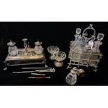 AN EARLY 20TH CENTURY SILVER PLATE AND CUT GLASS RECTANGULAR INKSTAND With taper candlestick and a