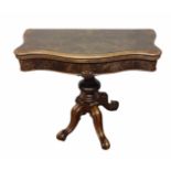 A VICTORIAN STYLE BURR WALNUT CARD TABLE The serpentine folding top opening to reveal a baize