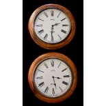 TWO VICTORIAN DESIGN STATION CIRCULAR WALL CLOCKS With glazed brass mounted bezel, the white dial