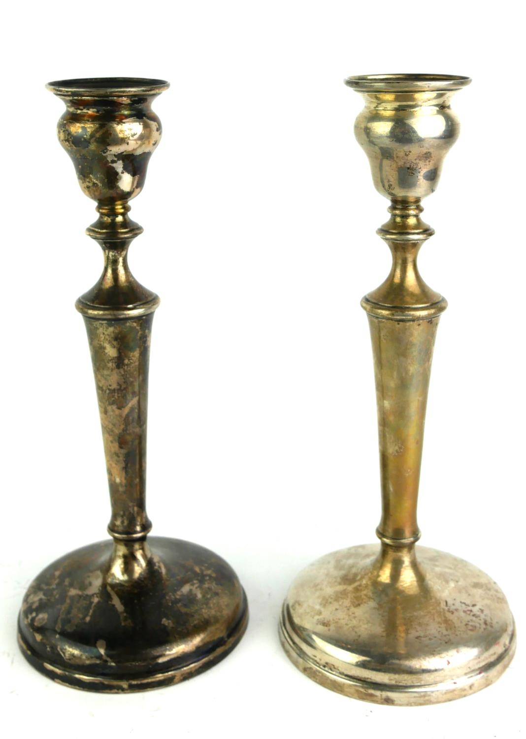 A PAIR OF EDWARDIAN PLAIN SILVER CANDLESTICKS On circular bases, hallmarked London, 1910. (approx