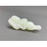 A pale celadon jade figure of a boy L 4.5cm