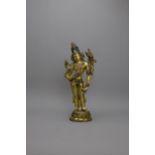 An attractive gilt bronze figure of a Standing Bodhisattva, Possibly 19th century - - H30cm W 6.