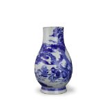 A blue and white bottle vase, of slender pear shape, well painted in bright blue with a lively