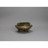 A Fine Bronze Tripod Censer,li ding, with double lion mask handles, six character cast mark of