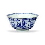 An octagonal blue and white bowl,Kangxi, painted on the exterior with alternating vignettes,one with