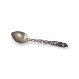 A rare Tibetan silver spoon,19th century L25.7cm W 5.8cm 108g the stem finely carved and chased with