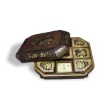 A black and gilt export lacquer games box and cover, enclosing trays and boxes for card games, c1850