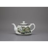 An Inscribed Teapot And Cover, 20th Century - - H9cm L15.5cm W10.5cm - - painted on one side with