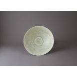 A petal rimmed Qingbai Bowl carved with peony,Southern Song Dynasty - - W 18cm, H 6cm