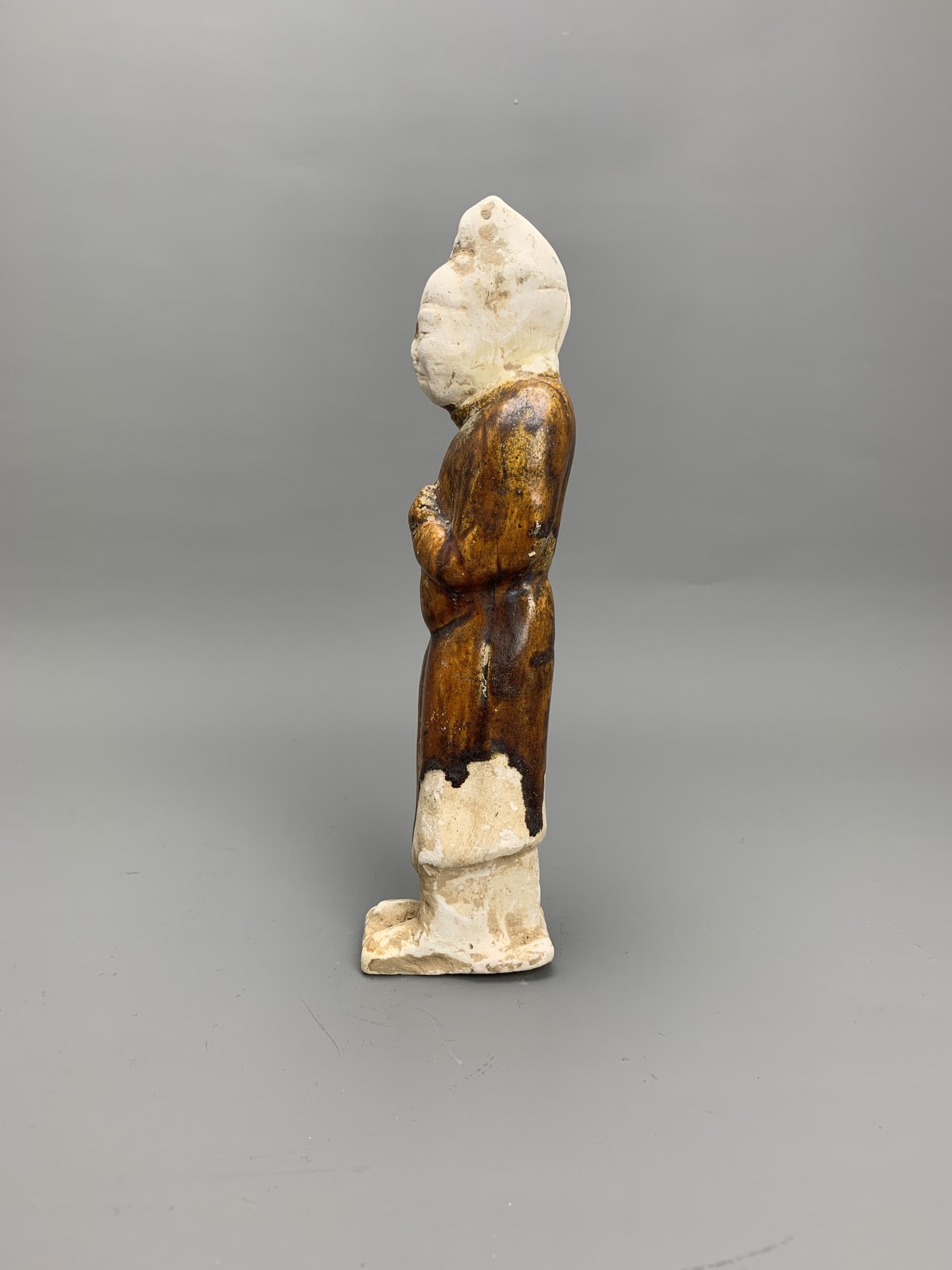 A chestnut glazed pottery tomb figure, Tang Dynasty H21cm L5.5cm the slender moustachioed figure - Image 3 of 8