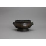 A bronze lion handle censer, standing on a tall foot, six character mark of Xuande - - H8.5cm L17.