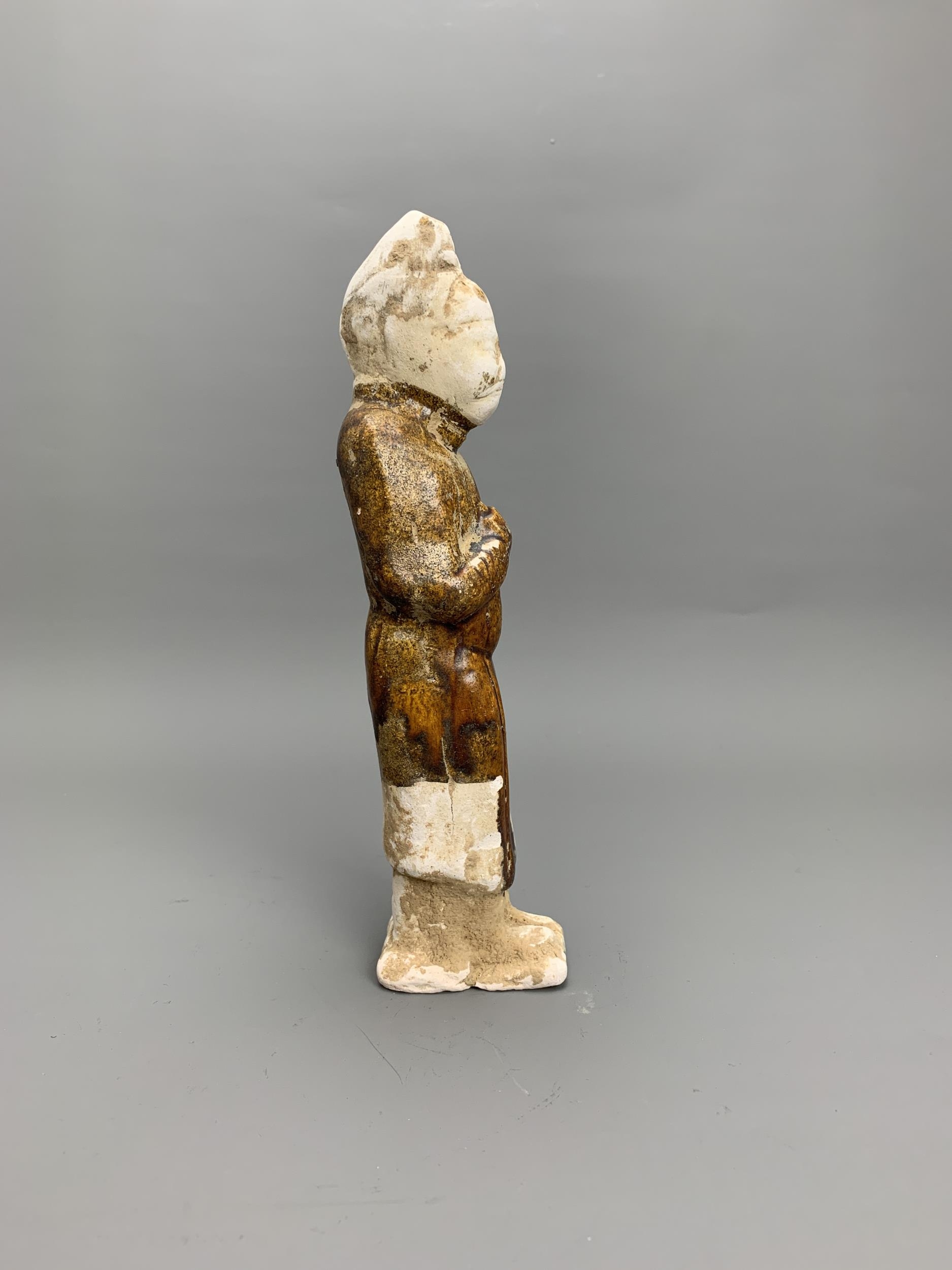 A chestnut glazed pottery tomb figure, Tang Dynasty H21cm L5.5cm the slender moustachioed figure - Image 2 of 8