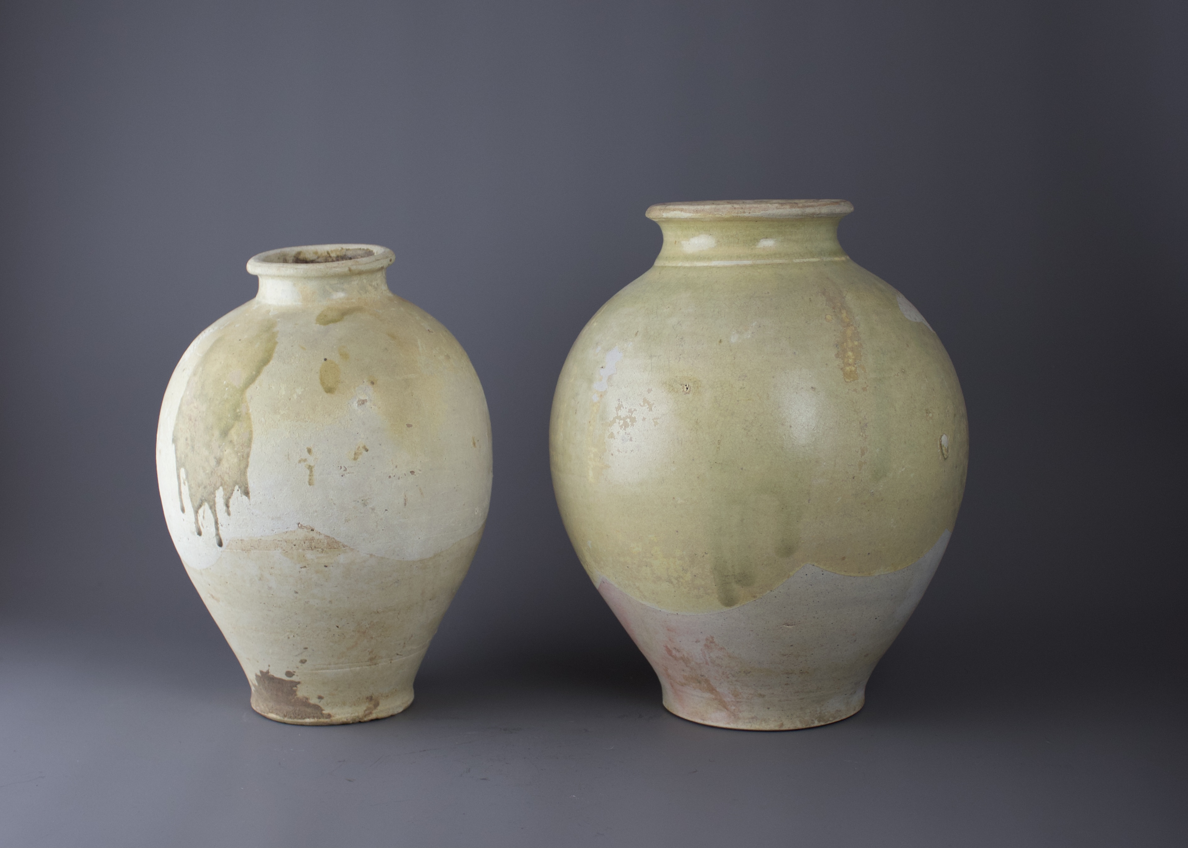 Two strawglazed ovoid Pottery Jars, Tang Dynasty H27cm and H24cm with the glaze stopping short of - Image 3 of 3